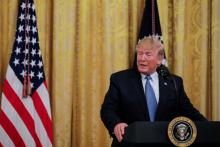 U.S. President Donald Trump speaks about his administration's environmental policy in the East Room of the White House in Washington, U.S., July 8, 2019. PHOTO BY REUTERS/Carlos Barria