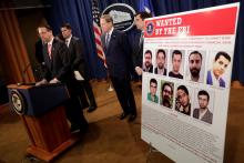 U.S. Deputy Attorney General Rod Rosenstein speaks at a news conference with other law enforcement officials at the Justice Department to announce nine Iranians charged with conducting massive cyber theft campaign, in Washington, U.S., March 23, 2018. PHOTO BY REUTERS/Yuri Gripas
