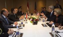 U.S. Secretary of State John Kerry (2nd R) meets with Egypt's Foreign Minister Nabil Fahmy (2nd L) in Cairo