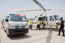 UNHAS members evacuate bodies of three aid workers, who were killed during an attack in the town of Rann, at Maiduguri Airport, Nigeria, March 2, 2018. PHOTO BY OCHA/Yasmina Guerda