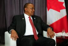 Kenya's President Uhuru Kenyatta looks over at Canadian Prime Minister Justin Trudeau during a meeting at the Fairmount Pacific Rim hotel in Vancouver, B.C., Canada June 3, 2019. REUTERS/Lindsey Wasson