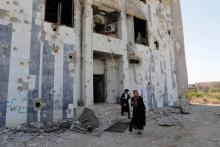 Libyans visit the destroyed headquarters of Benghazi University, in Benghazi, Libya, October 27, 2016. PHOTO BY REUTERS/Esam Omran Al-Fetori