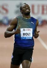 Usain Bolt of Jamaica celebrates as he wins the men's 100 metres at the Weltklasse Diamond League
