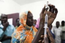 Staff members of the Teaching Hospital receive the first vaccination treatment for yellow fever in El Geneina, West Darfur, November 14, 2012. PHOTO BY REUTERS/Albert Gonzalez Farran