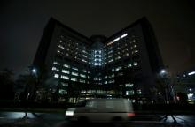 A van is seen on a road in front of Tokyo Regional Immigration Bureau which includes the Tokyo detention center in Tokyo, Japan, December 2, 2015. PHOTO BY REUTERS/Yuya Shino