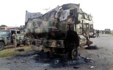 A damaged military vehicle is pictured in the northeast town of Gudumbali, after an attack by members of Islamic State in West Africa (ISWA), Nigeria, September 11, 2018. PHOTO BY REUTERS/Kolawole Adewale