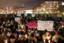 People attend a vigil in support of the Muslim community in Montreal, Quebec, January 30, 2017. PHOTO BY REUTERS/Dario Ayala