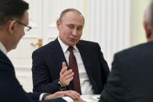 Russian President Vladimir Putin meets with co-chairs of his campaign office at the Kremlin in Moscow, Russia March 19, 2018. PHOTO BY REUTERS/Yuri Kadobnov