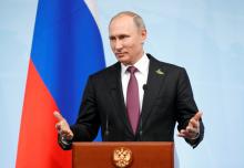 Russian President Vladimir Putin speaks during a news conference after the G20 summit in Hamburg, northern Germany, July 8, 2017. PHOTO BY REUTERS/Alexander Zemlianichenko