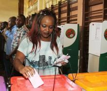 A Zambian casts her vote during the presidential and parliamentary elections in the capital Lusaka, Zambia, August 11, 2016. PHOTO BY REUTERS/Jean Serge Mandela