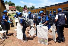 World Health Organization (WHO) workers prepare a centre for vaccination during the launch of a campaign aimed at beating an outbreak of Ebola in the port city of Mbandaka, Democratic Republic of Congo, May 21, 2018. PHOTO BY REUTERS/Kenny Katombe