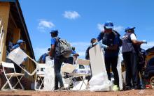 World Health Organization (WHO) workers prepare a centre for vaccination during the launch of a campaign aimed at beating an outbreak of Ebola in the port city of Mbandaka, Democratic Republic of Congo May 21, 2018. PHOTO BY REUTERS/Kenny Katombe