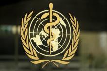 The World Health Organization (WHO) logo is pictured at the entrance of its headquarters in Geneva, January 25, 2015. PHOTO BY REUTERS/Pierre Albouy