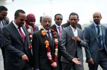 Ethiopia's Prime Minister Abiy Ahmed welcomes Eritrean Foreign Minister Osman Saleh and his delegation at the Bole International Airport in Addis Ababa, Ethiopia, June 26, 2018. PHOTO BY REUTERS/Tiksa Negeri