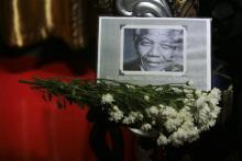 A portrait of late former South African President Nelson Mandela is pictured at the i-City Red Carpet Wax Museum in Shah Alam, outside Kuala Lumpur