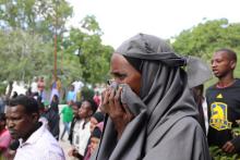 A Somali woman reacts at the scene of a car bomb explosion at a checkpoint in Mogadishu, Somalia, on December 28, 2019. PHOTO BY REUTERS/Feisal Omar