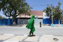 A woman walks past Somalia's National Theatre as it undergoes a renovation project in Mogadishu, Somalia, February 3, 2019. PHOTO BY REUTERS/Feisal Omar