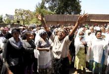 A woman cries at a gathering of the 30 Ethiopian victims killed by members of the militant Islamic State in Libya, in the capital Addis Ababa, April 21, 2015. PHOTO BY REUTERS/Tiksa Negeri