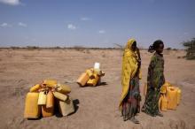 Women wait to collect water in the drought stricken Somali region in Ethiopia, January 26, 2016. PHOTO BY REUTERS/Tiksa Negeri