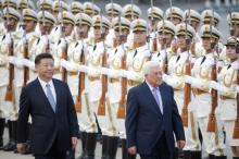 China's President Xi Jinping (L) and Palestinian President Mahmoud Abbas attend a welcoming ceremony outside the Great Hall of the People in Beijing, China, July 18, 2017. PHOTO BY REUTERS/Jason Lee