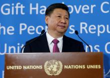 Chinese President Xi Jinping addresses the guests during a gift handover ceremony at the United Nations European headquarters in Geneva, Switzerland, January 18, 2017. PHOTO BY REUTERS/Denis Balibouse