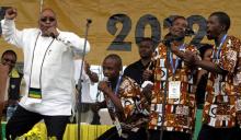 The new head of South Africa's ruling ANC, Jacob Zuma , is joined by a choir as he sings during the celebration of the African National Congress' (ANC) 96th Anniversary in Atteridgeville, Pretoria, January 12 2008. PHOTO BY REUTERS/Siphiwe Sibeko