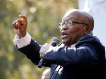 Former President Jacob Zuma sings with supporters after his appearance in the High Court where he faces charges that include fraud, corruption and racketeering, in Pietermaritzburg, South Africa, May 24, 2019. PHOTO BY REUTERS/Rogan Ward