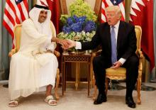 Qatar's Emir Sheikh Tamim Bin Hamad Al-Thani meets with U.S. President Donald Trump in Riyadh, Saudi Arabia, May 21, 2017. PHOTO BY REUTERS/Jonathan Ernst