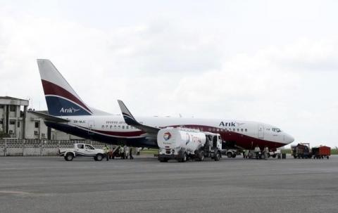 A Boeing 737-7BD Arik Air aeroplane is seen parked on the tarmac at the local airport in Lagos, file. PHOTO BY REUTERS/Akintunde Akinleye