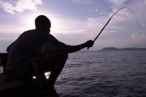 A Congolese fisherman casts his line in Lake Kivu in the eastern city of Goma. PHOTO BY REUTERS/Antony Njuguna