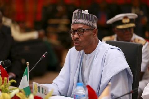 Nigeria's President Muhammadu Buhari speaks during the opening ceremony for the Summit of Heads of State and Governments of the Lake Chad Basin Commission (LCBC) at the presidential wing of the Nnamdi Azikiwe International Airport Abuja, Nigeria, June 11, 2015. PHOTO BY REUTERS/Afolabi Sotunde