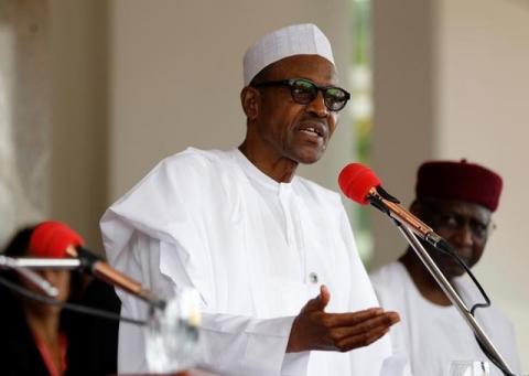 Nigerian President Muhammadu Buhari speaks at a joint news conference with his French counterpart Francois Hollande at the presidential villa in Abuja, Nigeria, May 14, 2016. PHOTO BY  REUTERS/Afolabi Sotunde