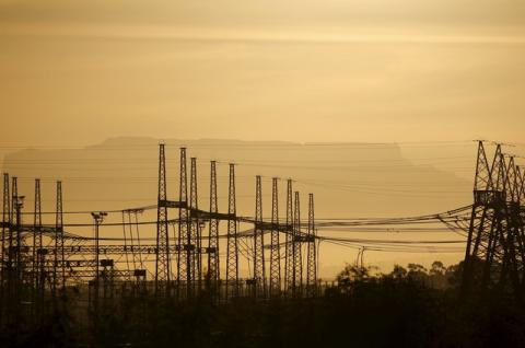Pylons carry electricity from South African power utility Eskom's Koeberg nuclear plant near Cape Town, November 28, 2015. PHOTO BY REUTERS/Mike Hutchings