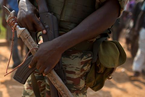 An African Union (AU) peacekeeping soldier holds a confiscated sword during a dispute between members of the local Christian community and ex-Seleka soldiers in Bangui, January 22, 2014. PHOTO BY REUTERS/Siegfried Modola