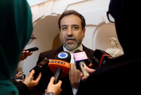Iran's top nuclear negotiator Abbas Araqchi talks to journalists after meeting senior officials from the United States, Russia, China, Britain, Germany and France in a hotel in Vienna, Austria, October 19, 2015. PHOTO BY REUTERS/Heinz-Peter Bader