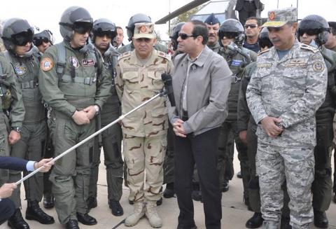 Egyptian President Abdel Fattah al-Sisi speaks during a meeting with pilots and crews specialists of the Egyptian Air Force near the border between Egypt and Libya, February 18, 2015. PHOTO BY REUTERS/Defence Ministry