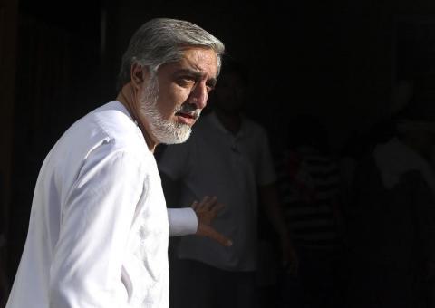 Afghan presidential candidate Abdullah Abdullah arrives for a news conference in Kabul