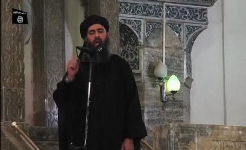 A man purported to be the reclusive leader of the militant Islamic State Abu Bakr al-Baghdadi has made what would be his first public appearance at a mosque in the centre of Iraq's second city, Mosul, according to a video recording posted on the Internet, July 5, 2014. PHOTO BY REUTERS/Social Media Website via Reuters TV