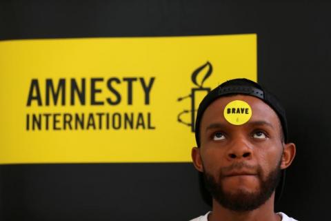 Human rights campaigner looks on during the release of an Amnesty International report in Abuja, Nigeria, May 16, 2017. PHOTO BY REUTERS/Afolabi Sotunde