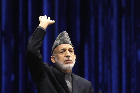 Afghan President Hamid Karzai speaks during the last day of the Loya Jirga, in Kabul