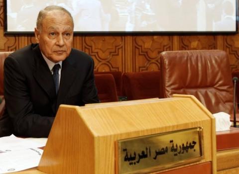 Ahmed Aboul Gheit sits beside an unoccupied seat for the Libyan foreign minister, at the opening of an emergency meeting among the Arab League foreign ministers, held to discuss issues about Libya, at the headquarters in Cairo, March 2, 2011. PHOTO BY REUTERS/Amr Abdallah Dalsh