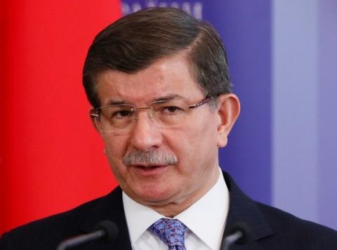 Turkish Prime Minister Ahmet Davutoglu looks on as he attends a news conference after a meeting with his Ukrainian counterpart Arseny Yatseniuk in Kiev, Ukraine, February 15, 2016. PHOTO BY REUTERS/Gleb Garanich
