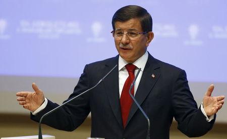 Turkey's Prime Minister Ahmet Davutoglu speaks during a meeting at his ruling AK Party headquarters in Ankara, Turkey, August 28, 2015. PHOTO BY REUTERS/Umit Bektas