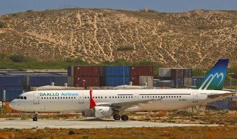 An aircraft belonging to Daallo Airlines is parked at the Aden Abdulle international airport after making an emergency landing following a bomb explosion inside the plane in Somalia's capital Mogadishu, February 3, 2016. PHOTO BY REUTERS/Feisal Omar
