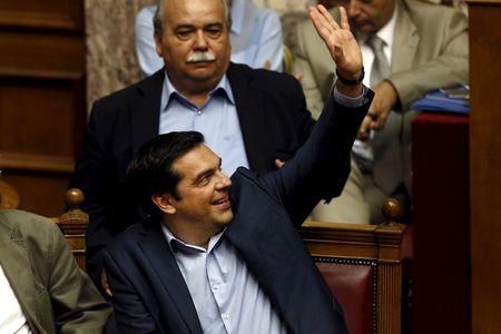 Greek Prime Minister Alexis Tsipras votes during a parliamentary session in Athens, Greece, July 23, 2015. PHOTO BY REUTERS/Yiannis Kourtoglou