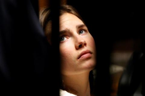 Amanda Knox, the U.S. student convicted of killing her British flatmate in Italy in 2007, looks on during a trial session in Perugia, January 22, 2011. PHOTO BY REUTERS/Alessia Pierdomenico