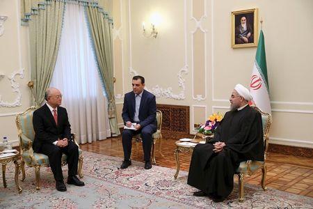International Atomic Energy Agency (IAEA) Director General Yukiya Amano (L) meets Iran's President Hassan Rouhani (R) in Tehran, September 20, 2015. PHOTO BY REUTERS/President.ir