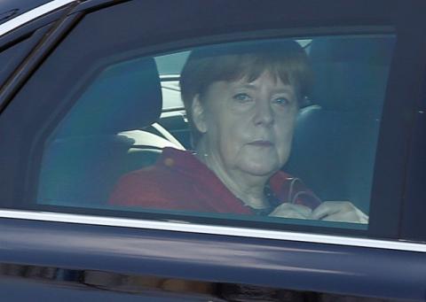 German Chancellor and leader of the Christian Democratic Union (CDU) Angela Merkel sits in her limousine as she arrives to a party's meeting in Berlin, Germany, March 14, 2016. PHOTO BY REUTERS/Fabrizio Bensch