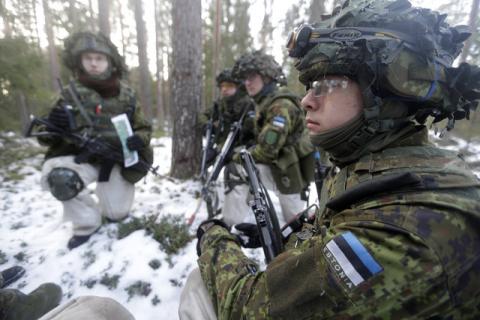 Estonian army conscript soldiers attend a tactical training in the military training field near Tapa, Estonia, February 16, 2017. PHOTO BY REUTERS/Ints Kalnins