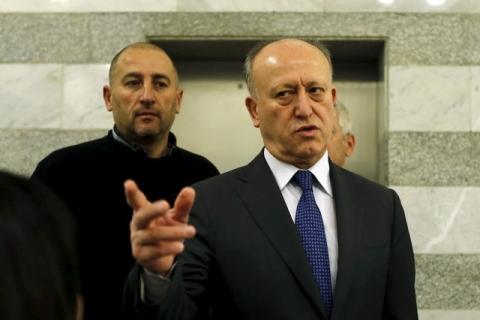 Lebanon's Justice Minister Ashraf Rifi gestures upon his arrival to attend a Cabinet session at the government palace in Beirut, January 22, 2015. PHOTO BY REUTERS/Mohamed Azakir